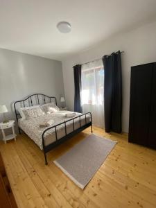 Postel nebo postele na pokoji v ubytování Apartmani Cvita