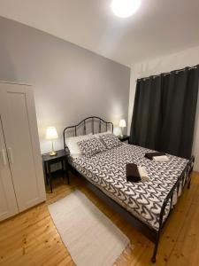 Postel nebo postele na pokoji v ubytování Apartmani Cvita