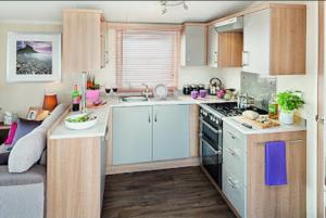 Kuchyň nebo kuchyňský kout v ubytování COASTAL CARAVAN ELIE sleeps 6