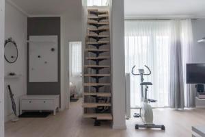 Televízia a/alebo spoločenská miestnosť v ubytovaní Apartment Maksimir Yard Zagreb
