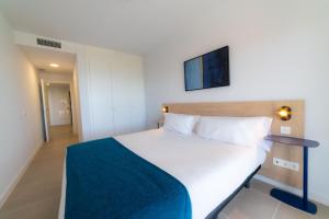 Aqua Apartments Bellamar, Marbella客房内的一张或多张床位