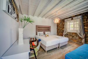 Ένα ή περισσότερα κρεβάτια σε δωμάτιο στο Anamar Blu +37 φωτογραφίες