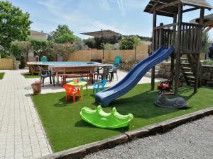 Legeområdet for børn på VILLA très bien équipée pour les vacances