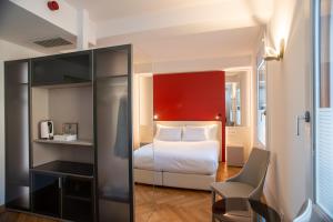 Letto o letti in una camera di Padova Suites C20