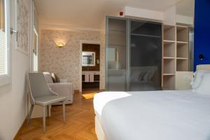 Letto o letti in una camera di Padova Suites C20