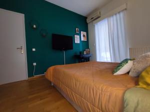 Posteľ alebo postele v izbe v ubytovaní Euphoria Apartment