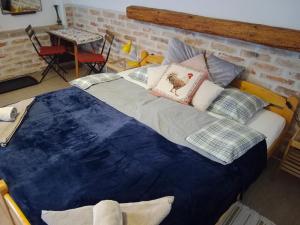 Postel nebo postele na pokoji v ubytování SRDEČNÁ - rodinný penzion a restaurace
