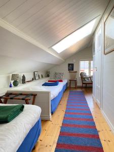 Säng eller sängar i ett rum på STF Kungsgården Långvind