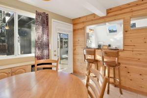a dining room with a table and chairs at The Pyramid In Big Bear #2124 by Big Bear Vacations in Big Bear City