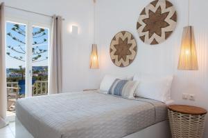 Ένα ή περισσότερα κρεβάτια σε δωμάτιο στο Villa Irini +155 φωτογραφίες