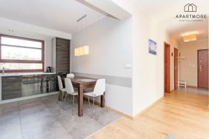 Kuchyňa alebo kuchynka v ubytovaní City Center - Torunska 18 by Apartmore