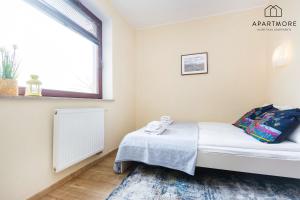Posteľ alebo postele v izbe v ubytovaní City Center - Torunska 18 by Apartmore