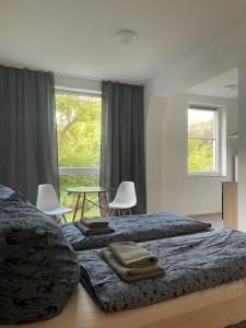 Postel nebo postele na pokoji v ubytování Appartements in der Kornstraße