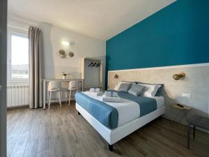 מיטה או מיטות בחדר ב-Porta alla Croce Guest House