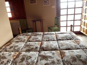 Postel nebo postele na pokoji v ubytování Hotel Tilve