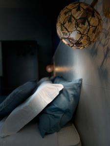 A bed or beds in a room at Porta alla Croce Guest House