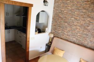 Postel nebo postele na pokoji v ubytování Apartamentos Las Buganvillas