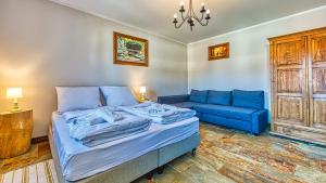 Posteľ alebo postele v izbe v ubytovaní Aparthotel STARA PIEKARNIA by ROYAL APARTS