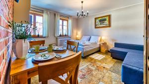 Posedenie v ubytovaní Aparthotel STARA PIEKARNIA by ROYAL APARTS