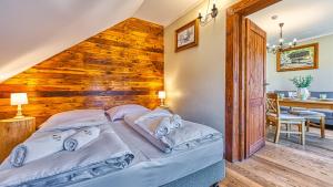 Posteľ alebo postele v izbe v ubytovaní Aparthotel STARA PIEKARNIA by ROYAL APARTS