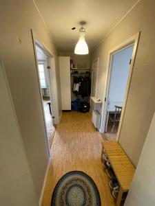a hallway with a door leading to a closet at Apartment in Stockholm, 48m2 in Mariatorget Södermalm in Stockholm