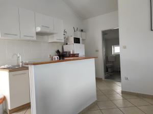 Kuchyň nebo kuchyňský kout v ubytování Apartman Eli 2