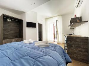 Postel nebo postele na pokoji v ubytování Sunny House - De Vivo Realty Sorrento