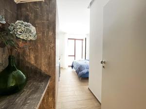 Postel nebo postele na pokoji v ubytování Sunny House - De Vivo Realty Sorrento