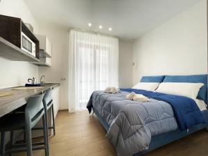 Postel nebo postele na pokoji v ubytování Sunny House - De Vivo Realty Sorrento