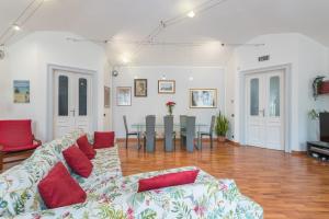 A seating area at San Salvario Family Apartment by Wonderful Italy