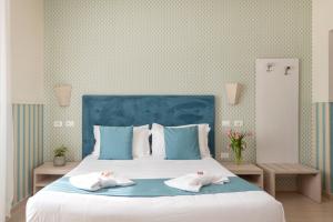 Postel nebo postele na pokoji v ubytování Hotel Parker - Gruppo BLAM HOTELS