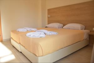 Posteľ alebo postele v izbe v ubytovaní International Hotel