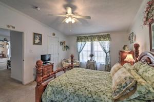 a bedroom with a bed and a ceiling fan at Oakland Retreat about 13 Mi to Deep Creek Lake! in Oakland