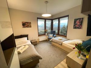 Posteľ alebo postele v izbe v ubytovaní Beskid Rose & SPA