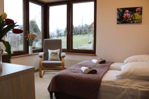Posteľ alebo postele v izbe v ubytovaní Beskid Rose & SPA