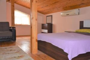 Postel nebo postele na pokoji v ubytování Dinara Hotel + 37 fotografií