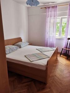 Apartment Lopar, Primorje-Gorski Kotar 1 tesisinde bir odada yatak veya yataklar