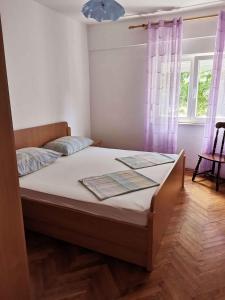 Apartment Lopar, Primorje-Gorski Kotar 1 tesisinde bir odada yatak veya yataklar