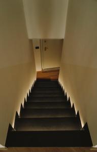 a staircase in a building with a stair case at Appartamento Villa Cristina in Genoa