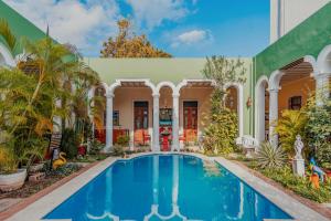 Bazén v ubytování Hotel Santa María Mérida nebo v jeho okolí