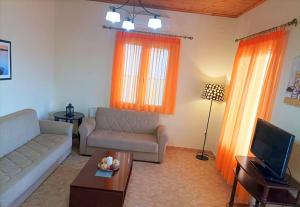 Posezení v ubytování Lourantos Bayside Apartments