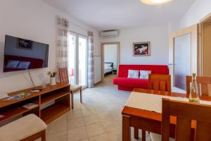 TV a/nebo společenská místnost v ubytování Apartments Vesna