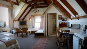 Kuchyň nebo kuchyňský kout v ubytování TNiqua Stable Inn