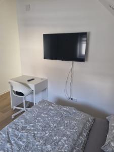 TV a/nebo společenská místnost v ubytování L8 Street - Leonbergerstraße 22