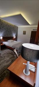 Postel nebo postele na pokoji v ubytování Villa Intryga