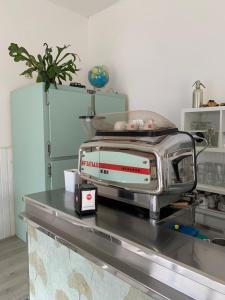 A kitchen or kitchenette at Hotel Lucerna Még 37 kép