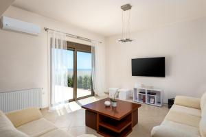 Μια τηλεόραση ή/και κέντρο ψυχαγωγίας στο Diamond Hill Villa +41 φωτογραφίες