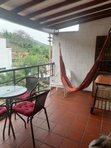 Un balcón o terraza en Apartamento para descanso en San Jerónimo. Antioquia.