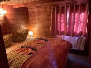Ein Bett oder Betten in einem Zimmer der Unterkunft Naturpark Kanone