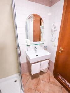 Vannituba majutusasutuses Hotel Martino
